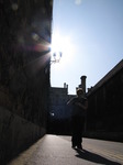 SX07849 Silhouette of Jenni and sun shining through Oxford streetlamp.jpg